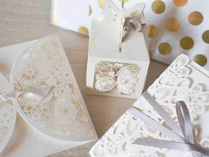 white wedding invitations on a table